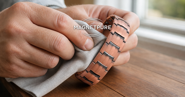 Polishing a copper magnetic bracelet with a soft cloth to prevent skin discoloration