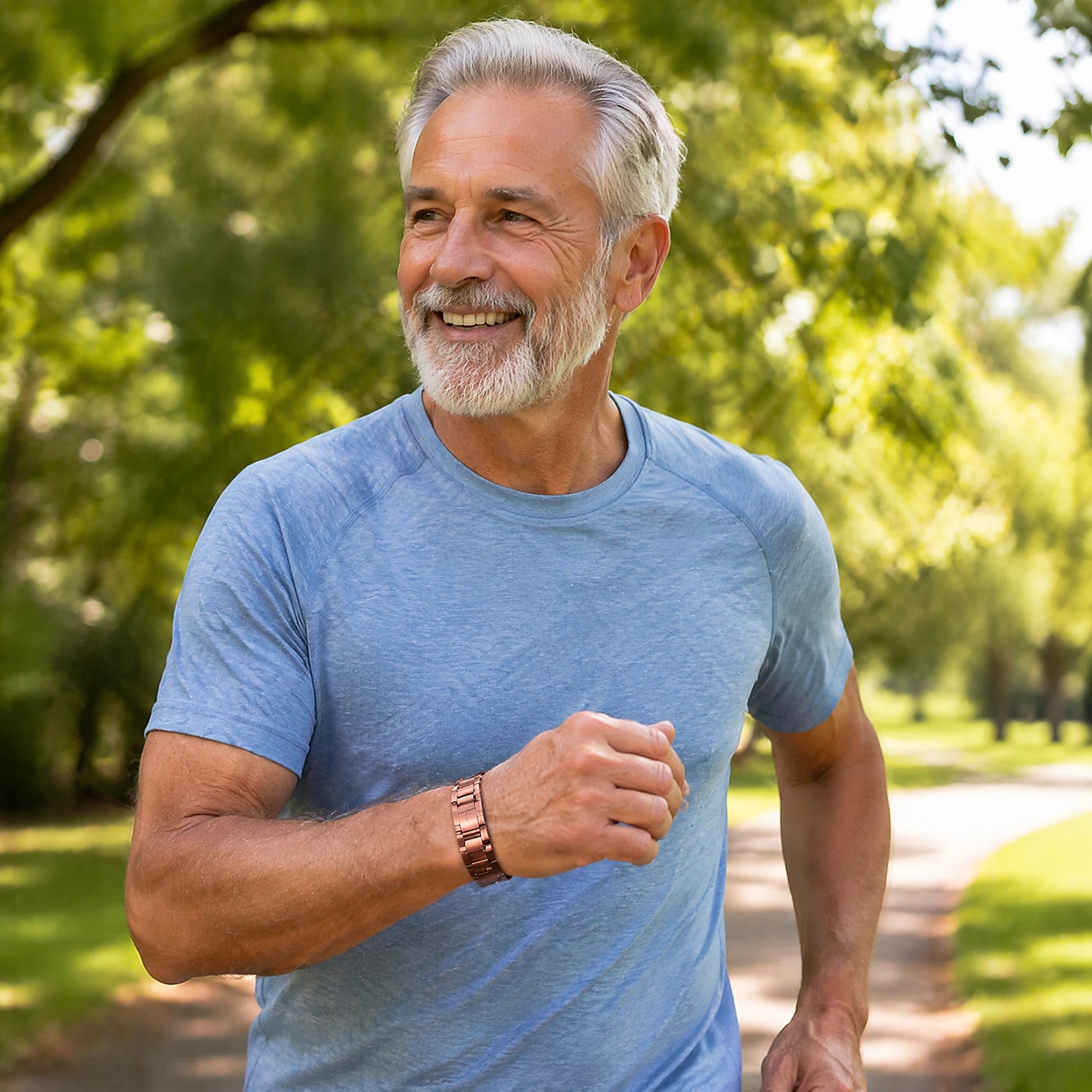 Active senior man wearing MagnetPure Watchband copper bracelet