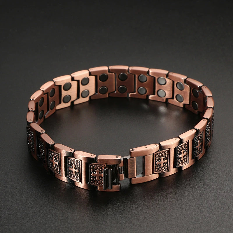 MagnetPure Cross Double Row copper bracelet on dark surface