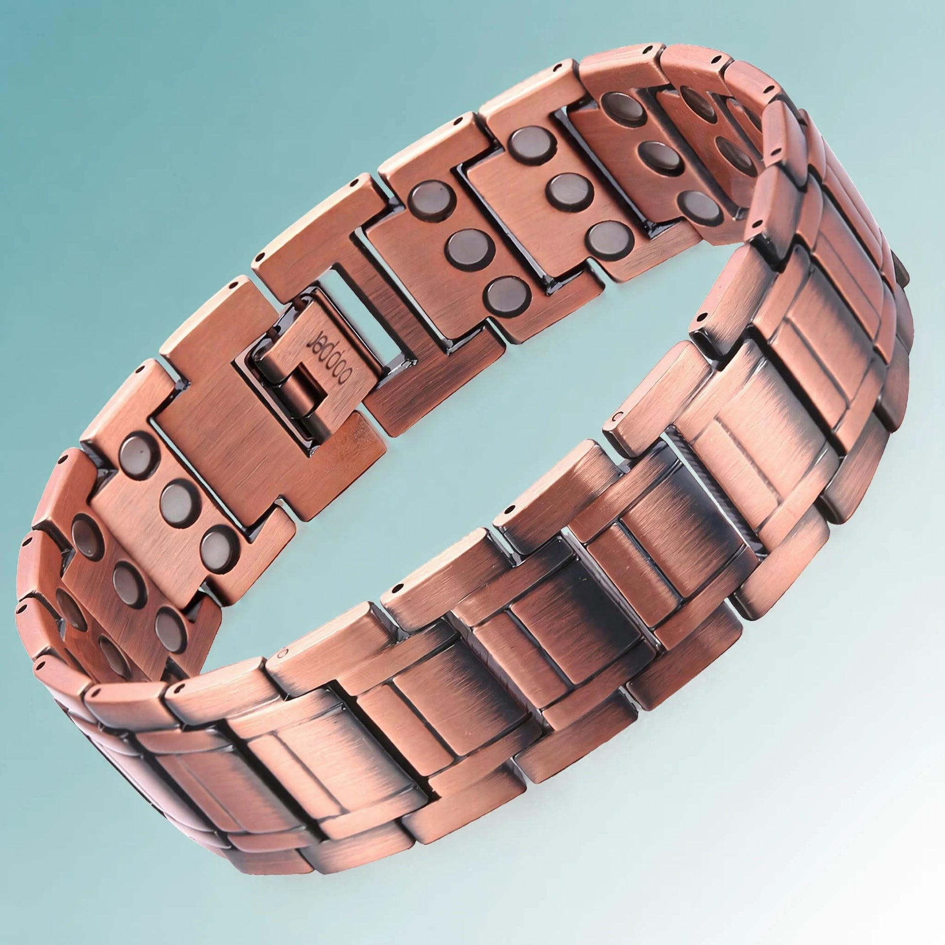 MagnetPure Watchband Triple Row push-button clasp variant on teal gradient